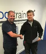 Deane teaching at FloorTrain